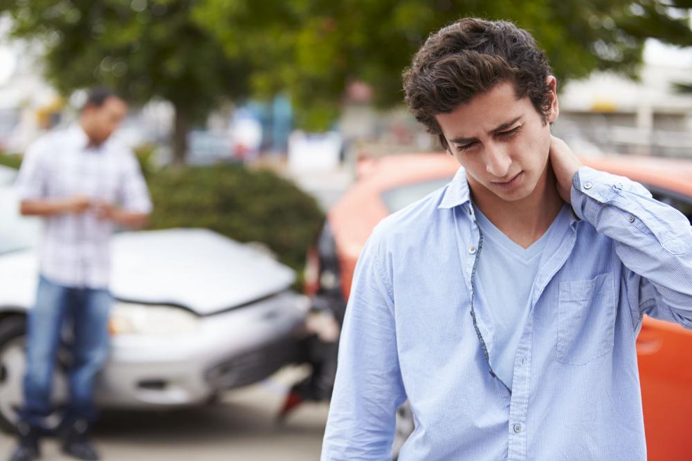 male walking away after an auto accident