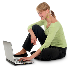 A woman using laptop on the ground